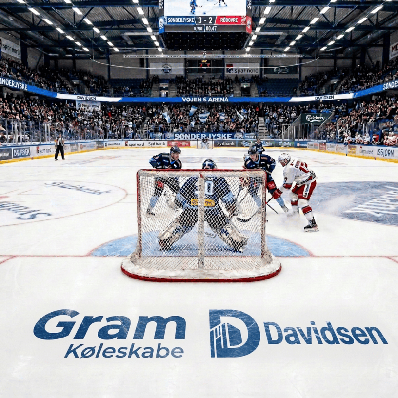 Ice hockey players compete near the goal during Sønderjyske versus Rødovre