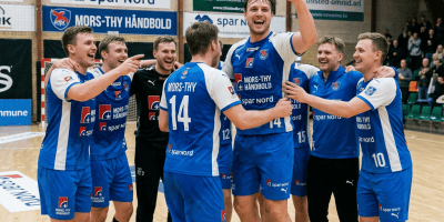Mors-Thy Handball players celebrating a 28–24 victory on court